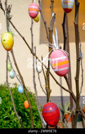 traditional hungarian easter tradition colourful decorative eggs hanging on small tree zala county hungary Stock Photo