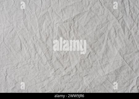 Gray crumpled natural cotton fabric, texture. Stock Photo