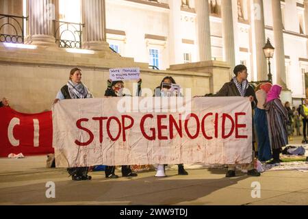 London, England, UK. 22nd Mar, 2024. Pro-Palestine protesters hold a Ramadan prayer service in Trafalgar Square. (Credit Image: © Tayfun Salci/ZUMA Press Wire) EDITORIAL USAGE ONLY! Not for Commercial USAGE! Stock Photo