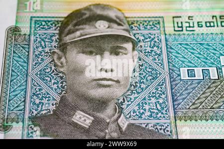 Portrait of General Aung San on Myanmar One Kyat currency banknote from 1972 (focus on center) Stock Photo