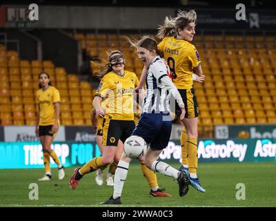 Wolverhampton, UK. 22nd Mar, 2024. Wolverhampton, England, March 22nd 2024: Players jump for the ball during the FA Womens National League game between Wolverhampton Wanderers and West Bromwich Albion at Molineux Stadium in Wolverhampton, England (Natalie Mincher/SPP) Credit: SPP Sport Press Photo. /Alamy Live News Stock Photo