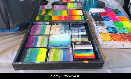 Vibrant Face Paint Palettes Ready for Artistic Creations Stock Photo