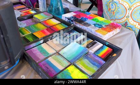 Vibrant Face Paint Palettes Ready for Artistic Creations Stock Photo