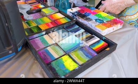 Vibrant Face Paint Palettes Ready for Artistic Creations Stock Photo
