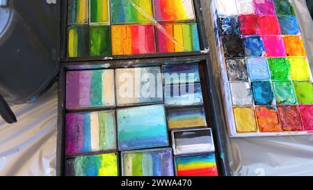 Vibrant Face Paint Palettes Ready for Artistic Creations Stock Photo