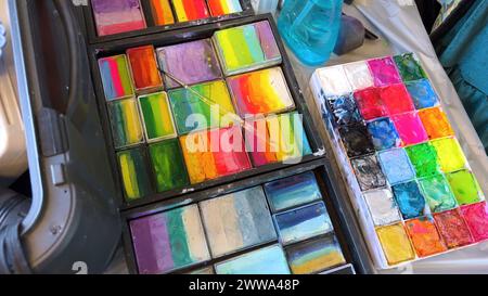 Vibrant Face Paint Palettes Ready for Artistic Creations Stock Photo