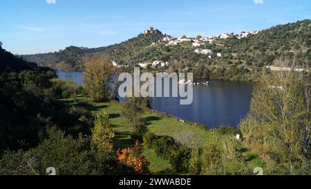 Tagus River, with the hilltop medieval Castle of Belver, on the right bank, overlooking the landscape, Belver, Portugal Stock Photo