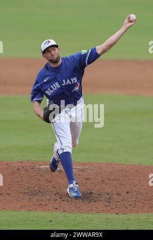 Dunedin, FL: Toronto Blue Jays relief pitcher Tim Mayza (58) delivers a pitch in the sixth inning during an MLB spring training game against the Bosto Stock Photo