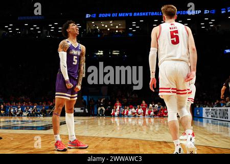 March 22, 2024: James Madison Dukes guard Terrence Edwards Jr. (5) yells in jubliation during the NCAA Men's March Madness Round One Tournament basketball game between the James Madison Dukes and the Wisconsin Badgers at the Barclays Center in Brooklyn, NY. Darren Lee/CSM Stock Photo