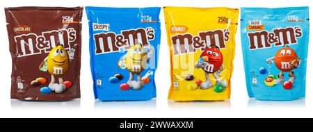 Stuttgart, Germany - May 19, 2023: Different M&M's chocolate confectionery types by Mars Inc. company isolated on white in Stuttgart, Germany. Stock Photo