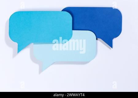 Blue speech bubbles with copyspace copy space communication information concept talking info Stock Photo