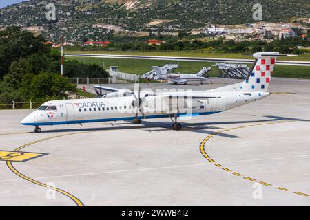 Split, Croatia - May 29, 2023: Croatia Airlines De Havilland Canada Dash 8 Q400 airplane at Split Airport (SPU) in Croatia. Stock Photo