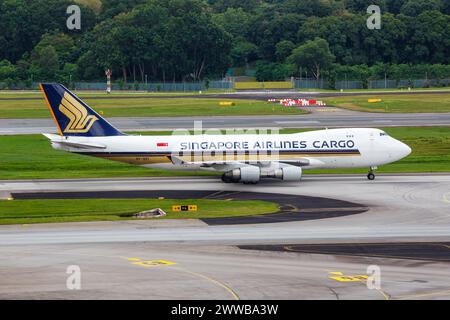 Changi, Singapore - February 3, 2023: Singapore Airlines Cargo Boeing 747-400F(SCD) airplane at Changi Airport (SIN) in Singapore. Stock Photo