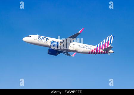 Munich, Germany - February 6, 2024: SKY Express Airbus A320neo airplane at Munich Airport (MUC) in Germany. Stock Photo