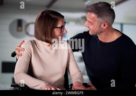 Happy Couple At Home In Living Room Stock Photo
