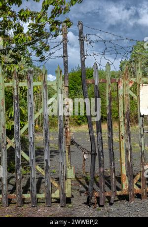 Chained rusty gates with padlock Stock Photo