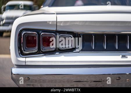 LINTHE, GERMANY - MAY 27, 2023: The stoplights of a mid-size car Dodge Charger 500, close-up. Art lens. Swirl bokeh. Die Oldtimer Show 2023. Stock Photo