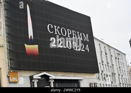 Moscow. 23rd Mar, 2024. This photo taken on March 23, 2024 shows a billboard displaying the image of a candle to mourn victims of a terrorist attack in Moscow, Russia. The death toll from Friday's terrorist attack has risen to 143 after gunmen stormed a concert hall in Moscow, Margarita Simonyan, editor-in-chief of RT broadcast said Saturday. Credit: Cao Yang/Xinhua/Alamy Live News Stock Photo