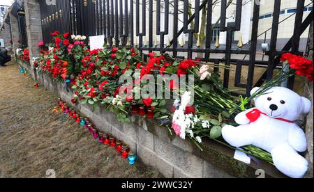 Minsk. 23rd Mar, 2024. Flowers are laid to commemorate victims of Moscow terrorist attack in front of the Russian Embassy in Minsk, Belarus on March 23, 2024. The death toll from Friday's terrorist attack has risen to 143 after gunmen stormed a concert hall in Moscow, Margarita Simonyan, editor-in-chief of RT broadcast said Saturday. Credit: Henadz Zhinkov/Xinhua/Alamy Live News Stock Photo