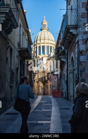 View from an old town alley to Duomo di San Giorgio, Ragusa Ibla, Ragusa, Sicily, Italy Stock Photo