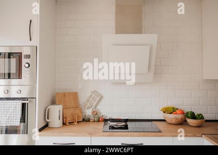 Modern kitchen with appliances at home Stock Photo