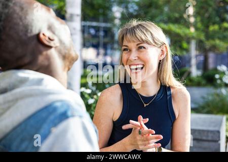 Happy young woman having fun with friend Stock Photo