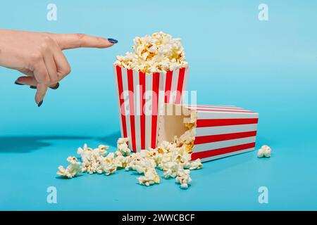 Creative still life of striped popcorn container with vintage style Stock Photo