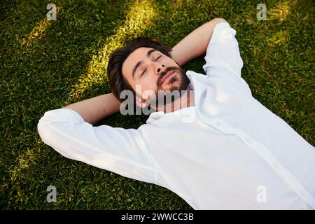 Young man relaxing on grass Stock Photo