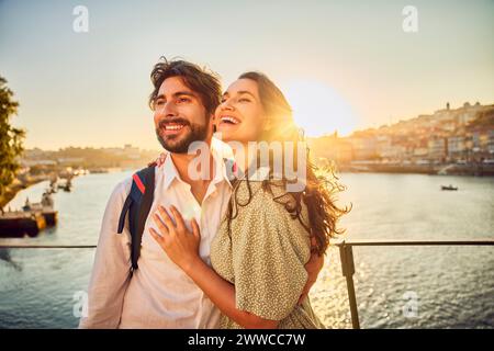 Happy young couple standing together Stock Photo