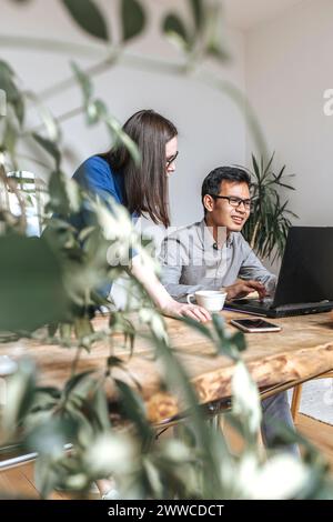 Diverse IT technicians working at startup in office Stock Photo