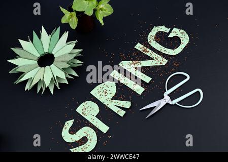 Cress seeds on paper letters Stock Photo