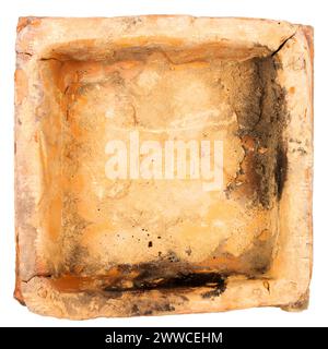 Old orange furnace tile isolated on white background Stock Photo