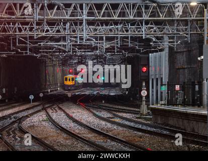 Last  Northern Rail class 319 train in service, 319368 passing Lime street cutting, Liverpool on its last day in service,  2 January 2024 Stock Photo