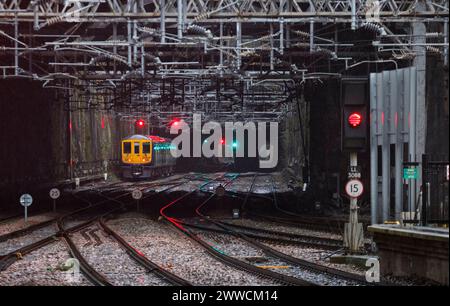 Last  Northern Rail class 319 train in service, 319368 passing Lime street cutting, Liverpool on its last day in service,  2 January 2024 Stock Photo