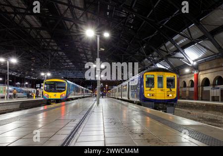 Last Northern Rail class 319, 319368 (right) at Liverpool Lime street on its last day in service with a Transpennine Express class 185, 2 January 2024 Stock Photo