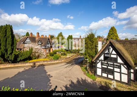 The White Lion a17th century black and white half timbered thatched roofed coaching inn in The Cheshire village of Barthomley Stock Photo