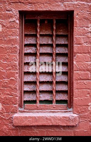 Drip Dried Red Paint on a Metal Vent Stock Photo