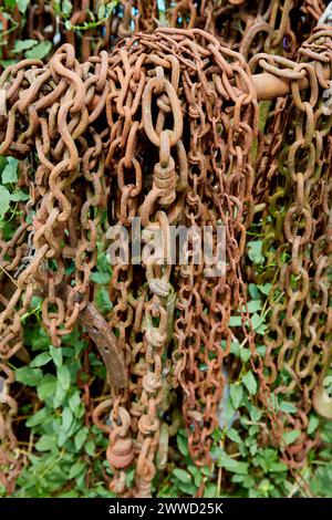 Tangle of Hanging Rusty Chains Stock Photo