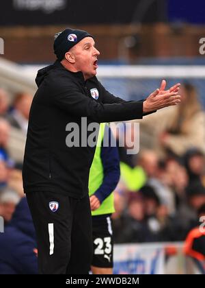 Chesterfield, UK. 23rd Mar, 2024. Chesterfield Manager Paul Cook shouts instruction to players during the Chesterfield FC v Boreham Wood FC Vanarama National League match at the SMH Group Stadium, Chesterfield, England, United Kingdom on 23 March 2024 Credit: Every Second Media/Alamy Live News Stock Photo