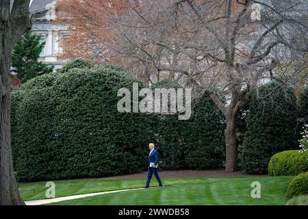 United States President Joe Biden walks from the Oval Office of the White House in Washington, DC to board Marine One en route to Delaware on Friday, March 22, 2024. Credit: Bonnie Cash/Pool via CNP Stock Photo