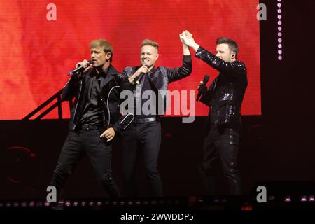 Mexico City, Mexico. 22nd Mar, 2024. Nicky Byrne, Shane Filan, and Kian Egan of the Irish band Westlife are performing during The Wild Dreams Tour at the Arena CDMX in Mexico City, Mexico, on March 22, 2024. (Photo by Luis Marin/Eyepix Group) Credit: NurPhoto SRL/Alamy Live News Stock Photo
