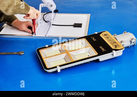 Stand alone LED street light with solar module, DIY assembly at home. Stock Photo