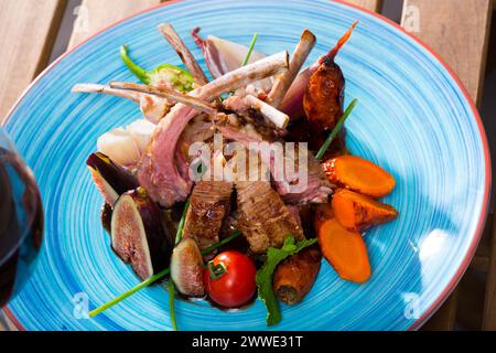 Plate of roasted mutton ribs Stock Photo