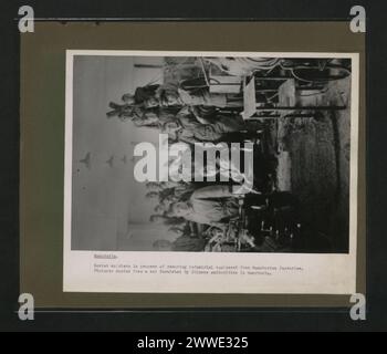 Description: Manchuria. Soviet soldiers in process of removing industrial equipment from Manchurian factories. Pictures copied from a set furnished by Chinese authorities in Manchuria. Location: Manchuria, China Date: 1946 china, asia, redarmy, asiathroughalens Stock Photo