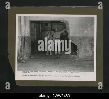 Description: Toyo Rubber Tire Company - Mukden, Manchuria. Photograhed by U.S. Signal Corps, 16 June 1946. Doorway in the interior wall enlarged for removal of equipment used for rubber processing. Location: Mukden, China Date: 16 June 1946 china, asia, asiathroughalens Stock Photo