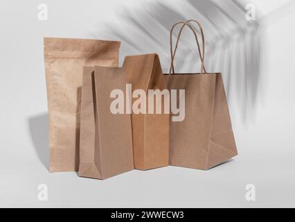 Kraft paper bag, pouch, sack, box. Brown beige eco package, packs for product, gifts. Stock Photo