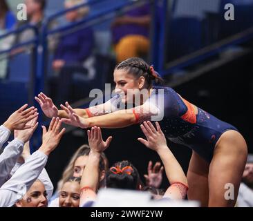 March 23, 2024: Auburn's Cassie Stevens high fives her teammates after her beam routine during the 2024 SEC Gymnastics Championships at Smoothie King Center in New Orleans, LA Kyle Okita/CSM (Credit Image: © Kyle Okita/Cal Sport Media) Stock Photo