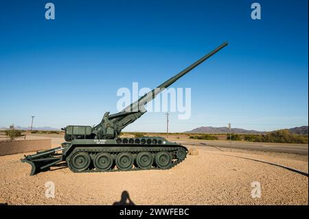 A large artillery gun on display at the entrance to the Yuma Proving Ground.  Near Yuma AZ, USA. Stock Photo