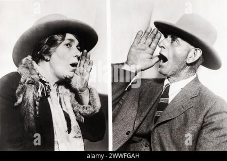 Oakland, California  1929    The champion cow-callers of the world are Mrs. Kate Meyer of Oakland, champion woman caller, in fact only woman cow-caller in the country, whose cow-coaxing voice can be heard for mile and a half; and Ben F. Howard of Brown's Station, Truckee Meadows, Nevada, is the champ. bovine-baritonizer, or Holstein-enticer, or cow-cajoler--for men or women whose call can be heard for a distance of two miles. They recently demonstrated their abilities at the Pacific Slope Dairy. Show held here in Oakland. Stock Photo
