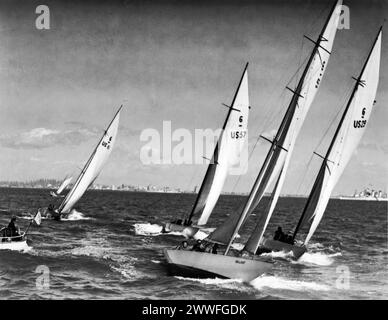 Los Angeles, California, February 21, 1938 Three crack six meter racing craft, (L to R foreground) 'Mystery', 'Gallant' and 'Lanai', stage a nip and tuck contest through Los Angeles Harbor and Long Beach waters as the 12th annual National Midwinter Regatta gets under way. Coming up fast in the rear is the 'Ayayay'. Stock Photo